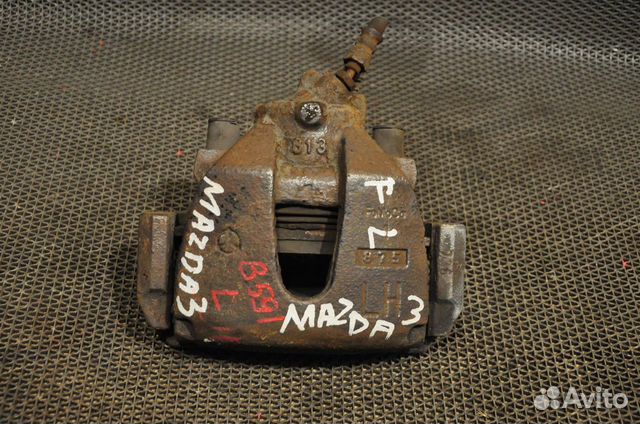 Суппорт передний левый mazda 3 BK