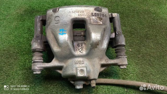 Суппорт тормозной передний правый Toyota Corolla