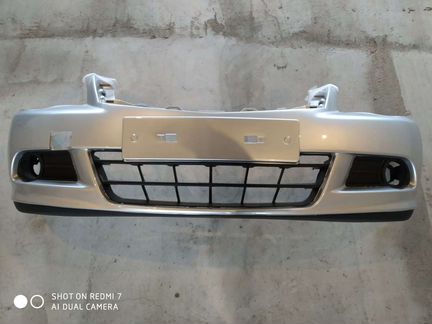 Бампер Ниссан Альмера G15. новый,серебристый