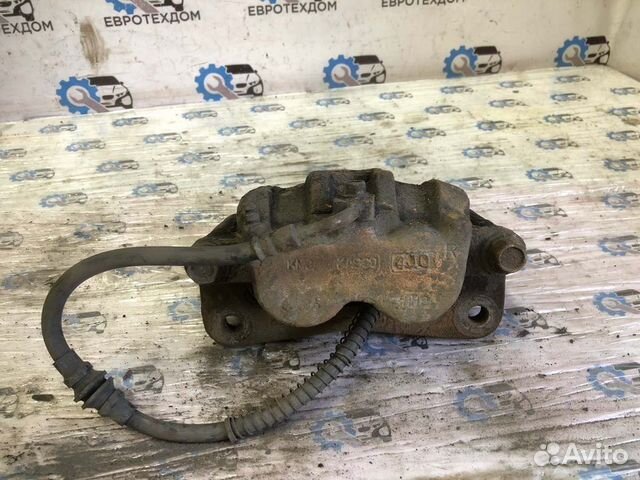 Суппорт передний правый Kia Carnival J3 2004