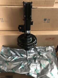 Амортизатор передний левый Киа Рио 11 16