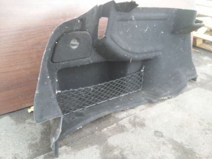 Обшивка багажника левая Mercedes W207