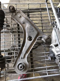 Рычаг левый Шевроле Лачетти