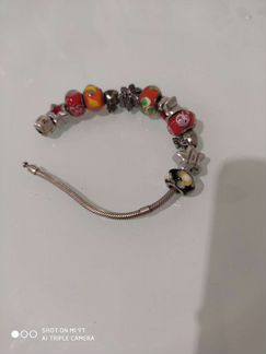 Серебряный браслет с шармами